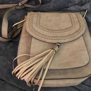 brown crossbody bag, never used but unbranded. strap included